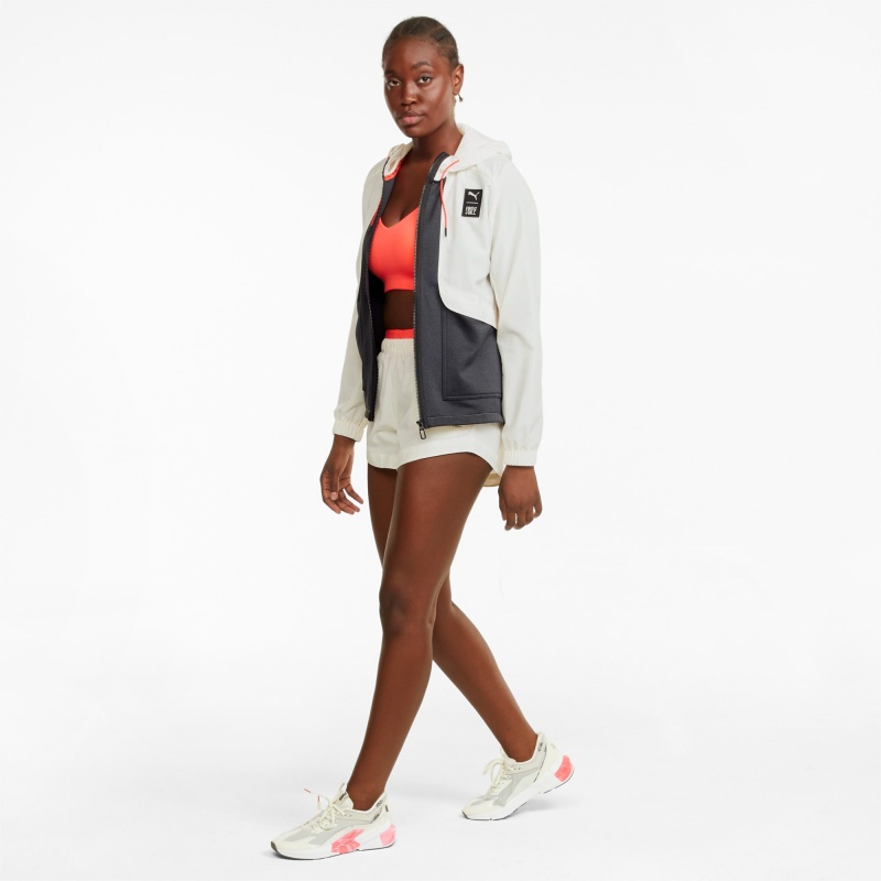 Chamarras Puma PUMA x FIRST MILE Woven Entrenamiento Ivory Glow | 31596PFEB